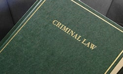 Book with the words CRIMINAL LAW on the cover